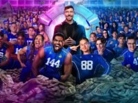 MrBeast stands at the center of the Beast Games arena surrounded by hundreds of contestants wearing blue numbered jerseys, with piles of cash and money flying through the air, representing the high-stakes Amazon Prime competition show.
