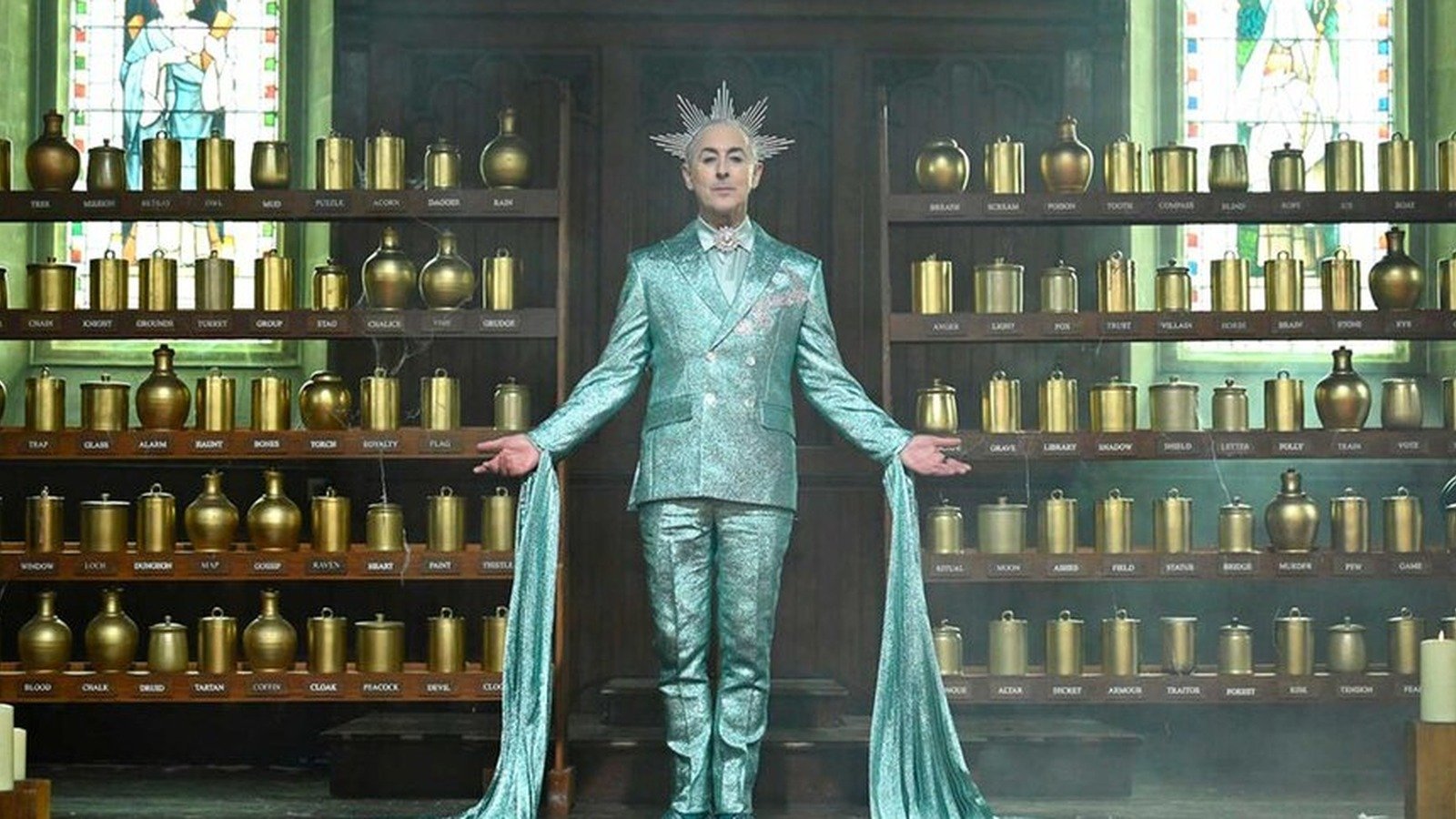 The Traitors New Blood 01 alan cumming wearing a teal sparkly outfit with a green  16x9 official promo still